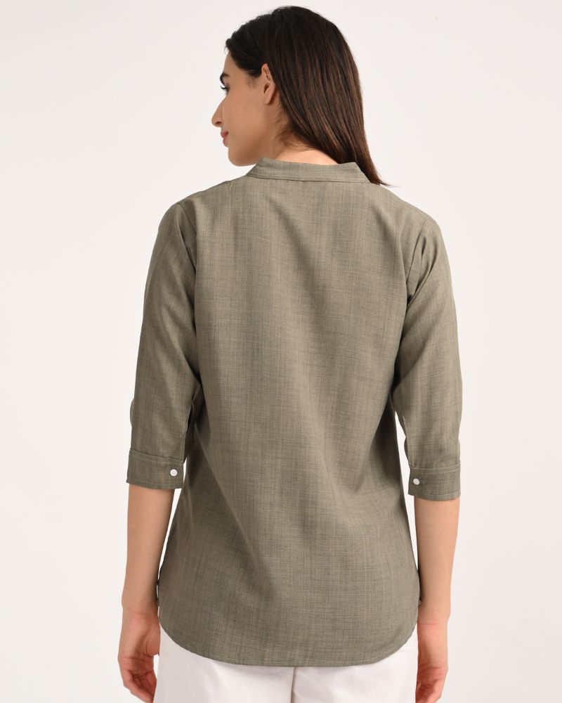 Back view of women’s short kurta in olive green linen blend fabric
