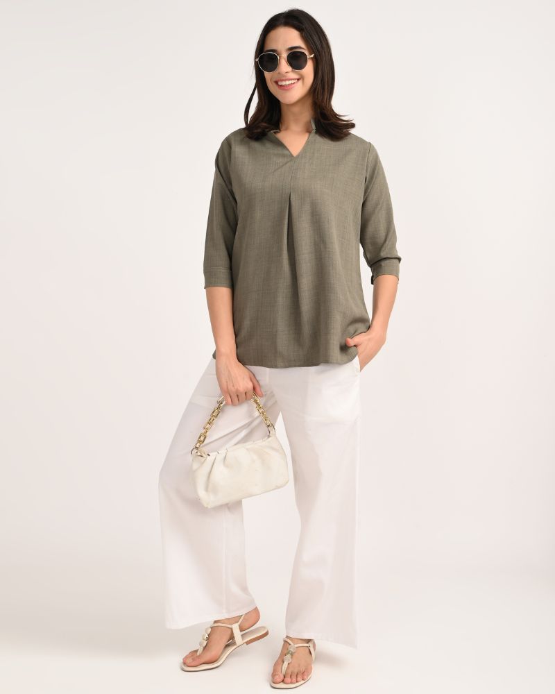 Model wearing olive green linen blend short kurta with white pant