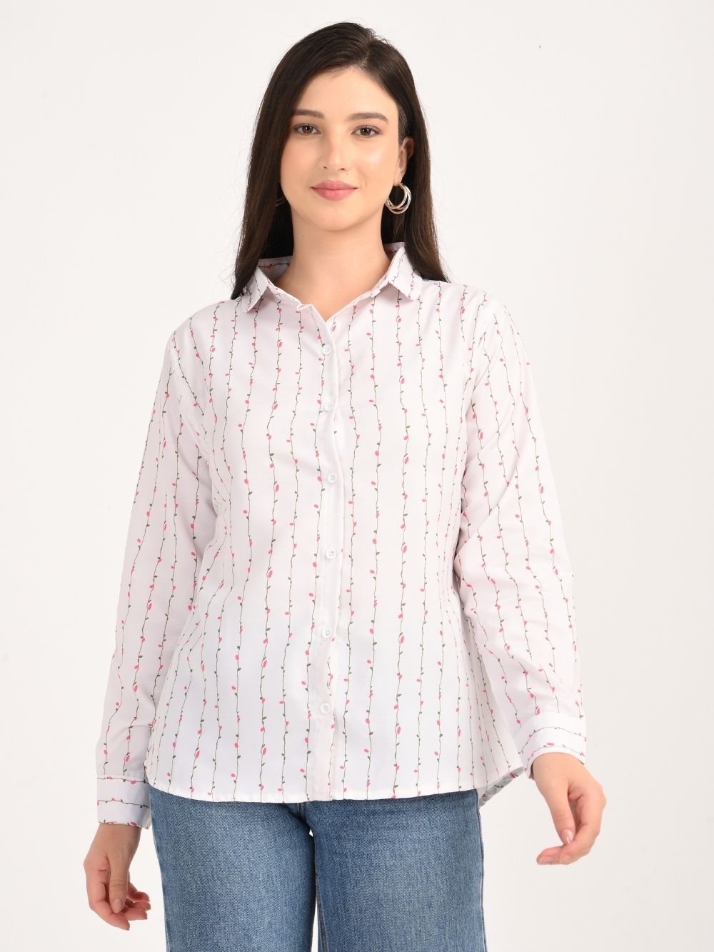 Woman in blossom stripe shirt standing front view