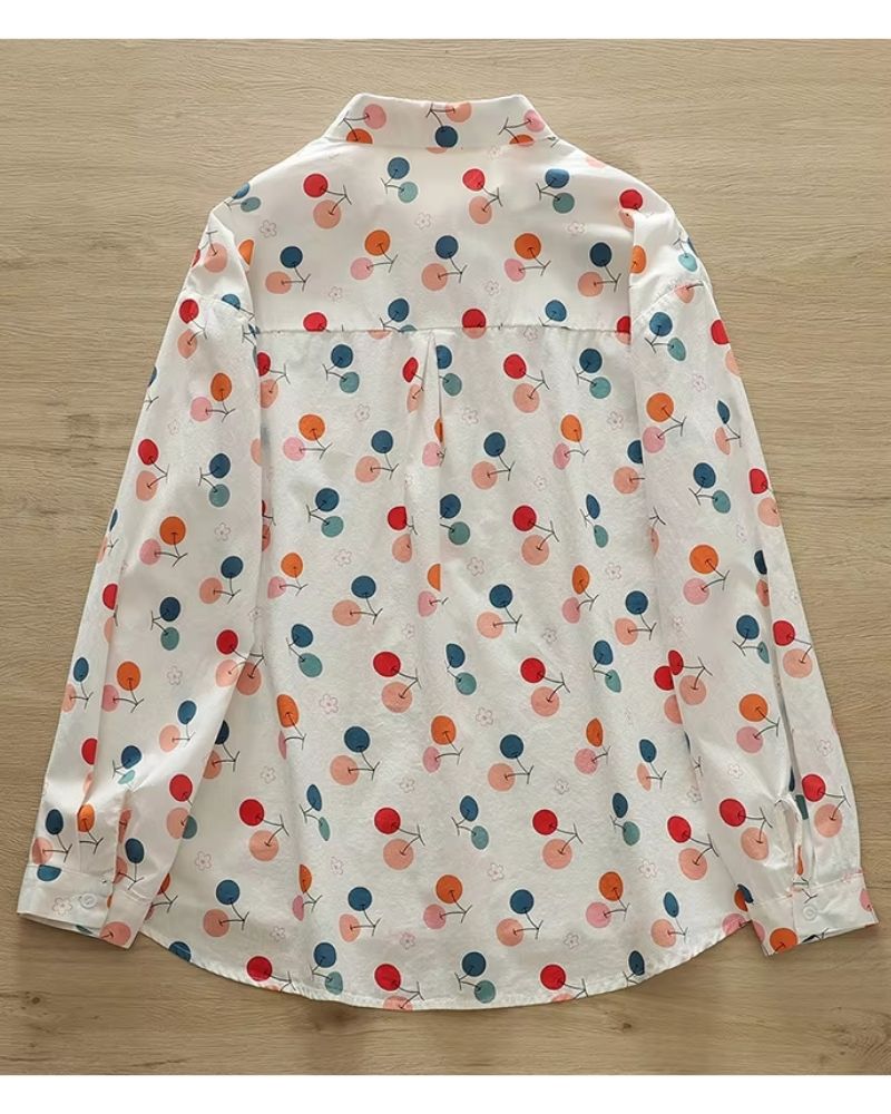 “Back of floral rayon shirt for women showing yoke and curved hem – Bubbly Botanica”

