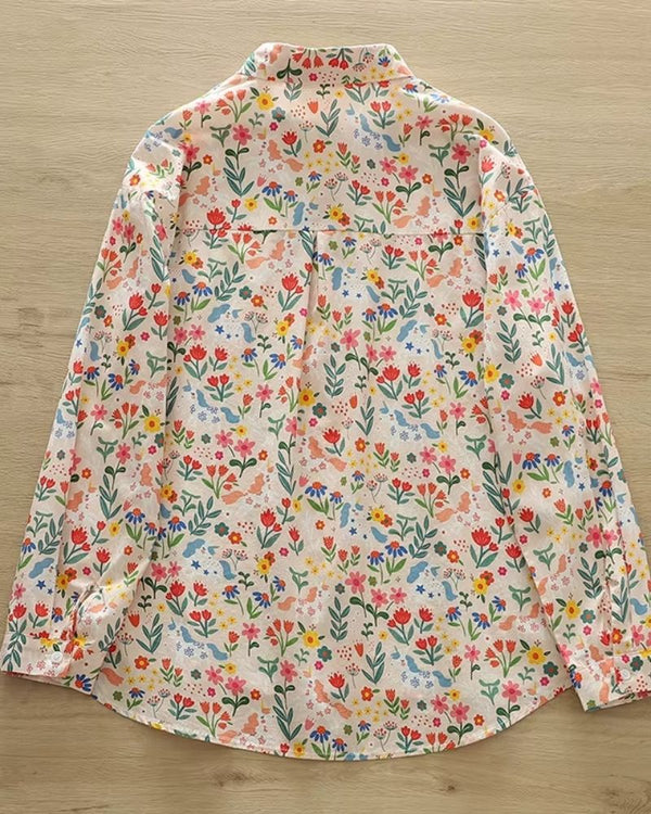 Back view of La Lune Botanique shirt showing continuous botanical and fantasy-themed pattern on lightweight rayon


