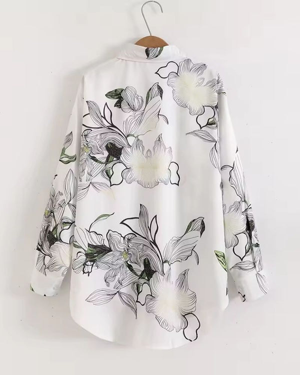 Back view of Opaline Botanica women’s button-down shirt with monochrome floral artwork