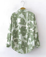 Back view of Verde Amour women's rayon shirt with oversized floral pattern

