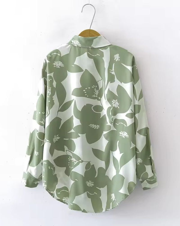 Back view of Verde Amour women's rayon shirt with oversized floral pattern

