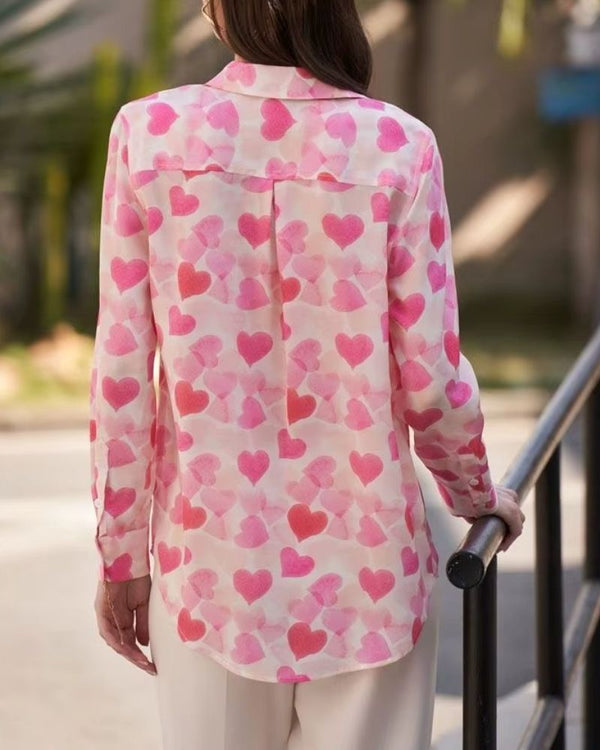 Back view of heart print shirt showing curved hem and yoke detail

