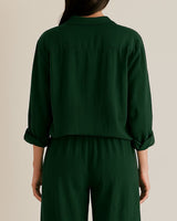 Back view of women’s crinkle cotton loungewear set in rich forest green

