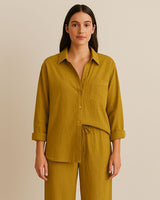 Back view of women’s mustard cotton loungewear set – shirt and wide-leg pants