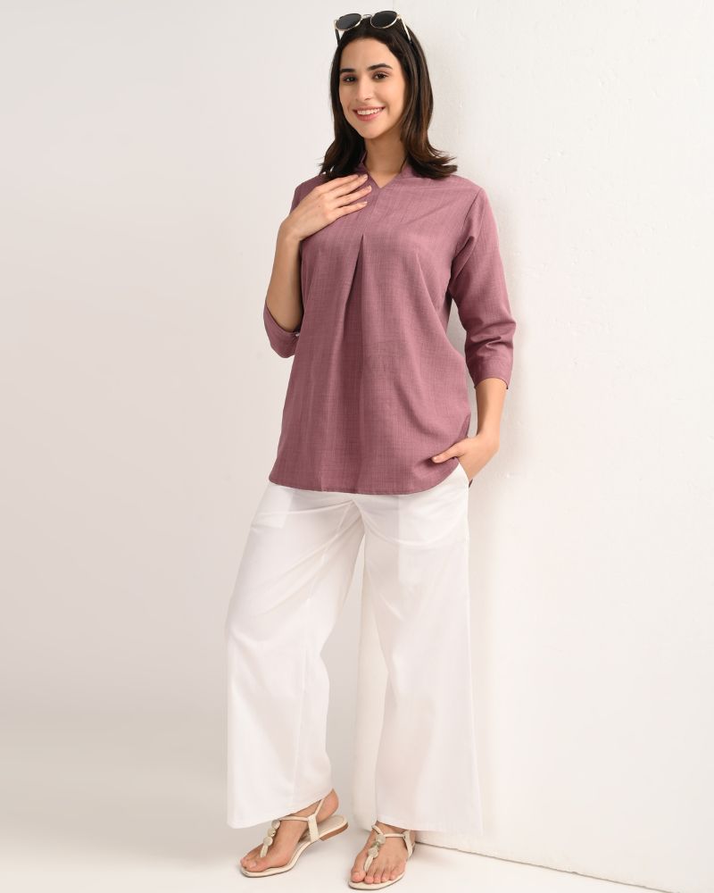 “Model styling Mauve Linen-Blend Short Kurta with trousers”
