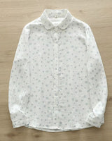 Celeste Bloom women’s floral rayon shirt with button-down front and Peter Pan collar, displayed flat

