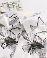 Collar close-up of Opaline Botanica shirt showing botanical print details