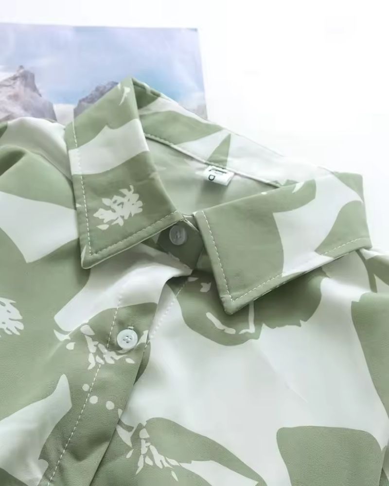Collar detail of Verde Amour green and white printed shirt for women

