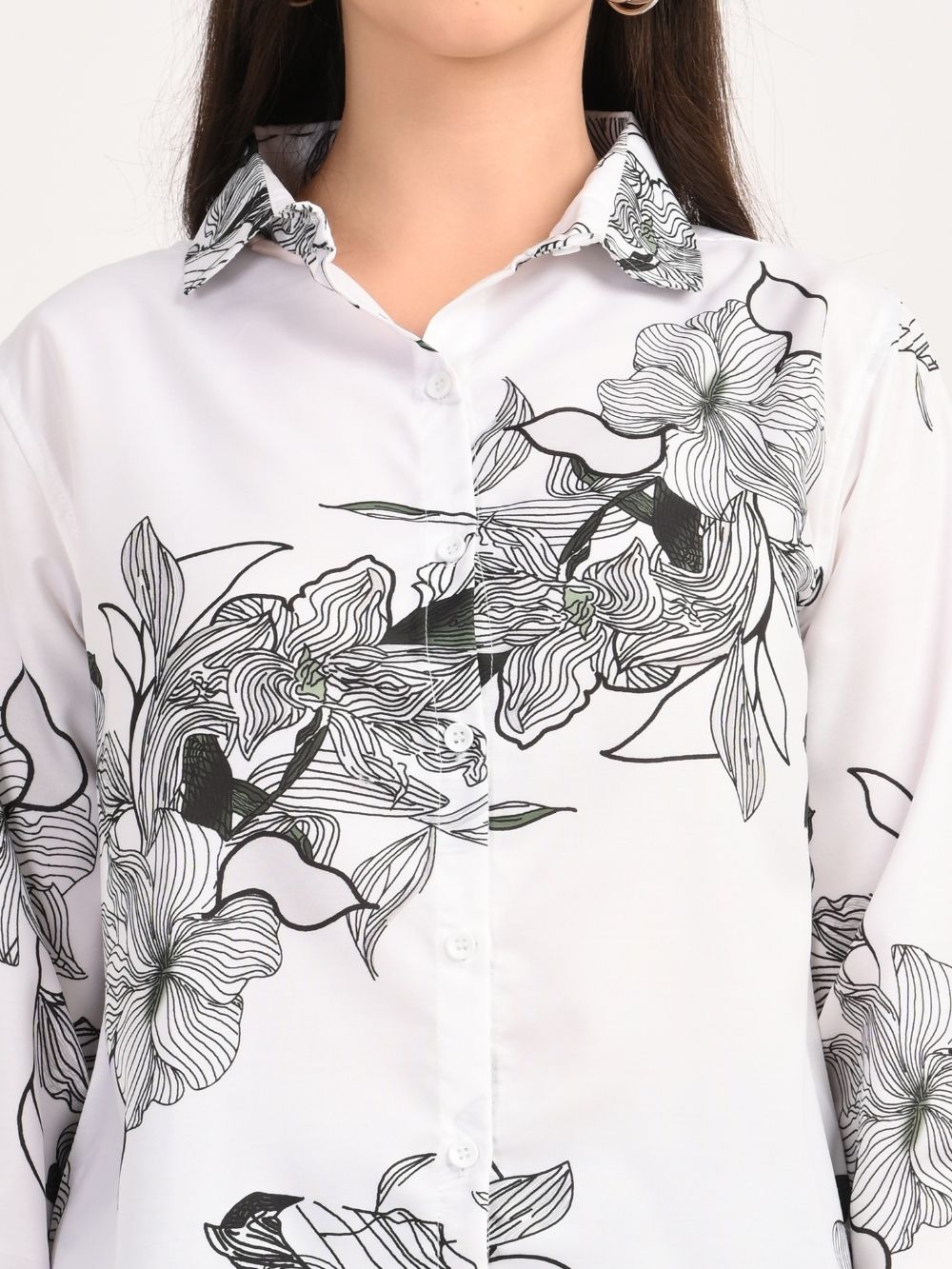 Detailed collar and print close-up of floral shirt