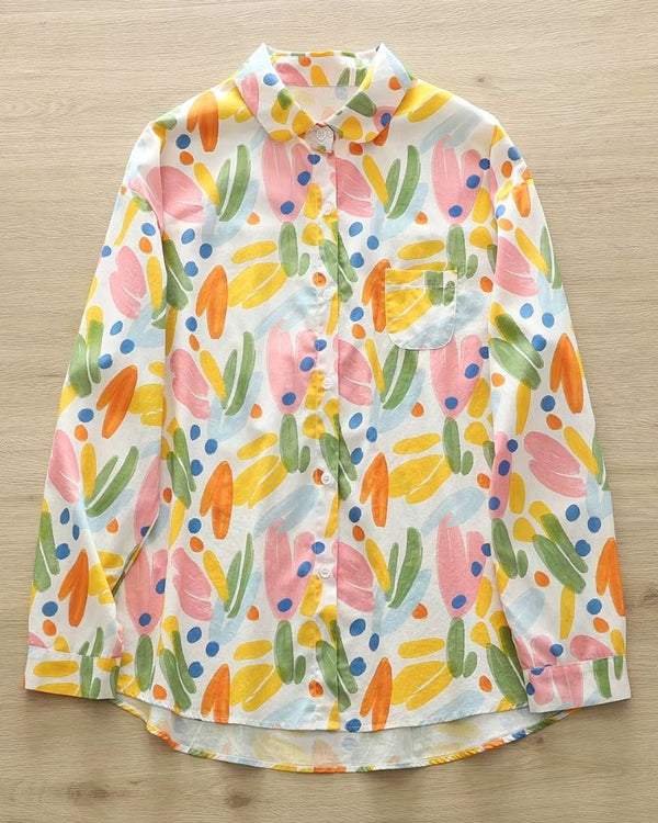 Front view of Solstice Garden Watercolor Rayon Shirt featuring vibrant abstract floral print

