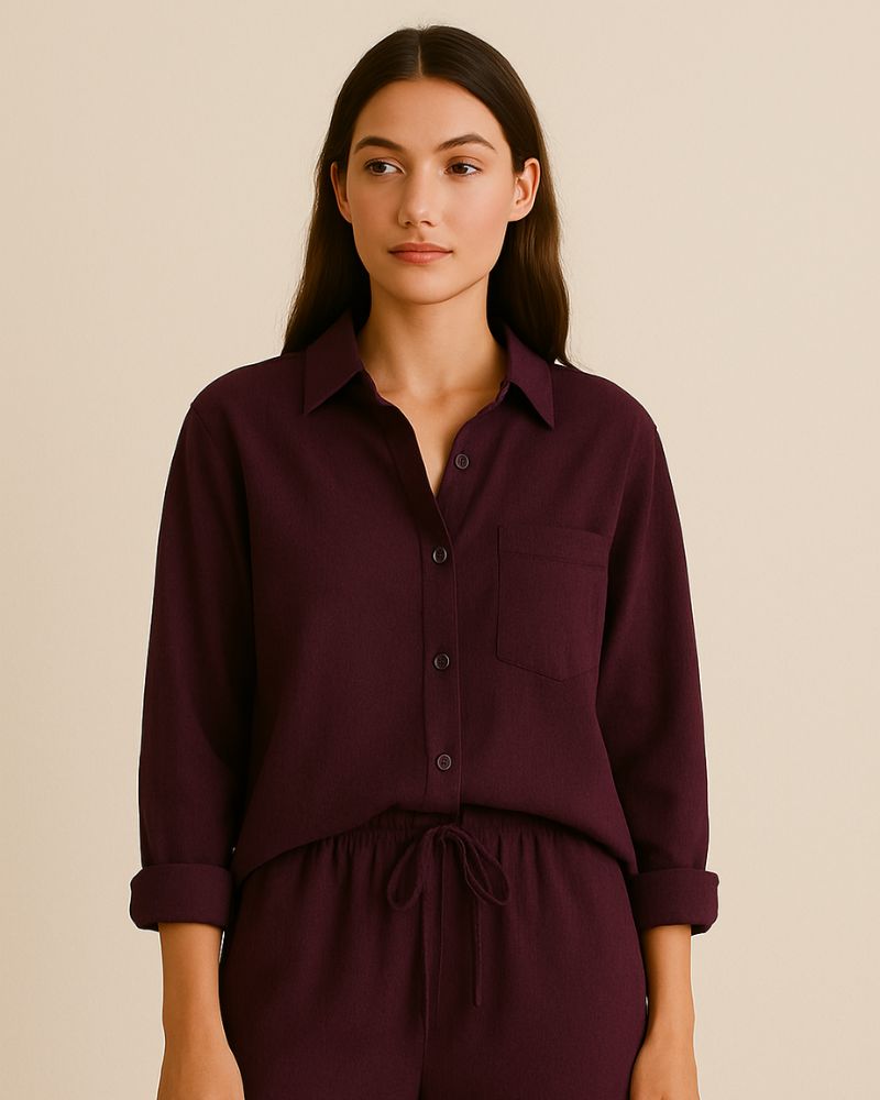“Front view of burgundy cotton muslin co-ord set with shirt tucked in drawstring pants”

