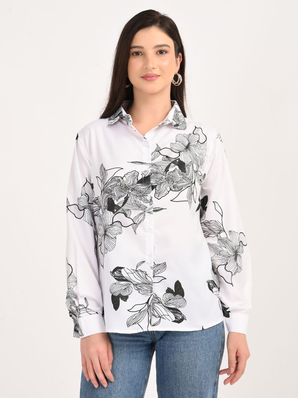 Front view of floral print shirt, model smiling