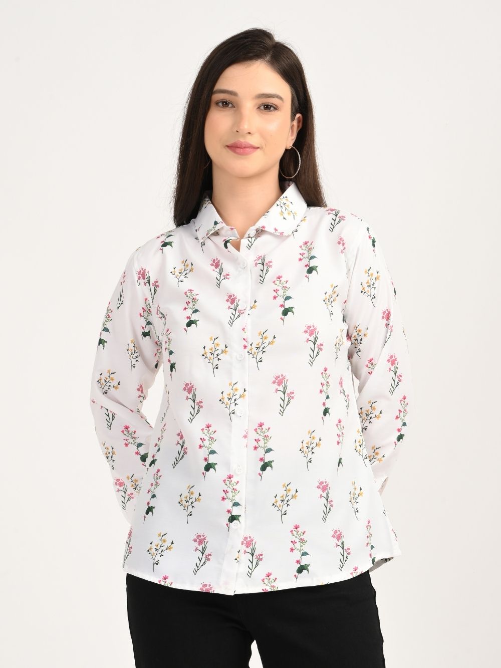 Front view of floral shirt with hands behind