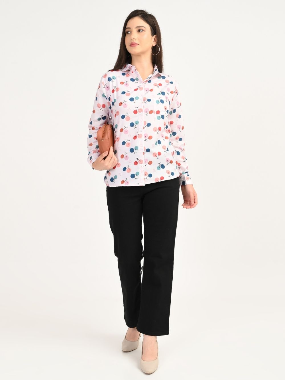 Full look of Cherry Bloom cherry print shirt styled with black pants