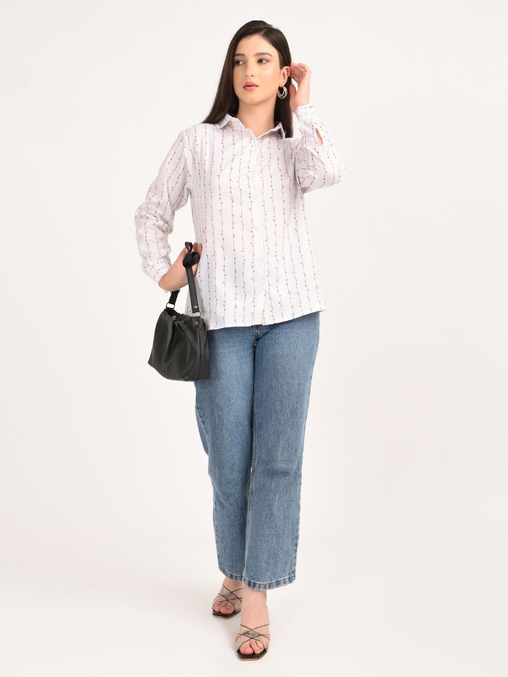 Full look of blossom stripe shirt styled with jeans