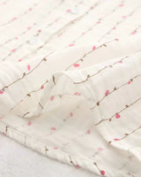 Lightweight rayon hemline detail showing fabric transparency and delicate stitching

