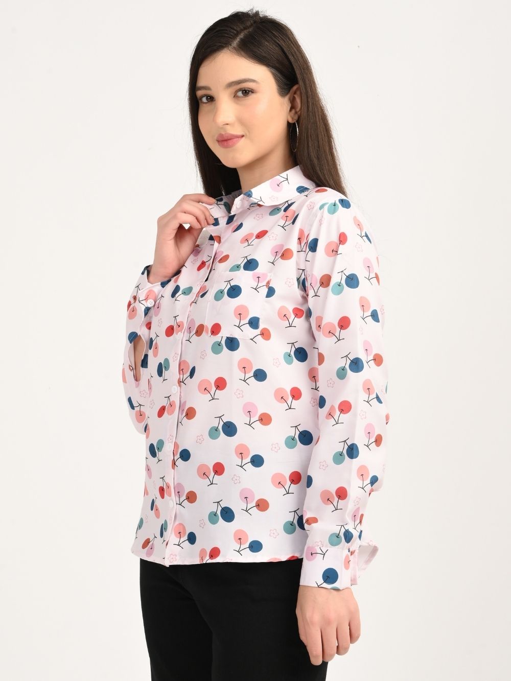 Model in Cherry Bloom cherry print shirt, side angle view