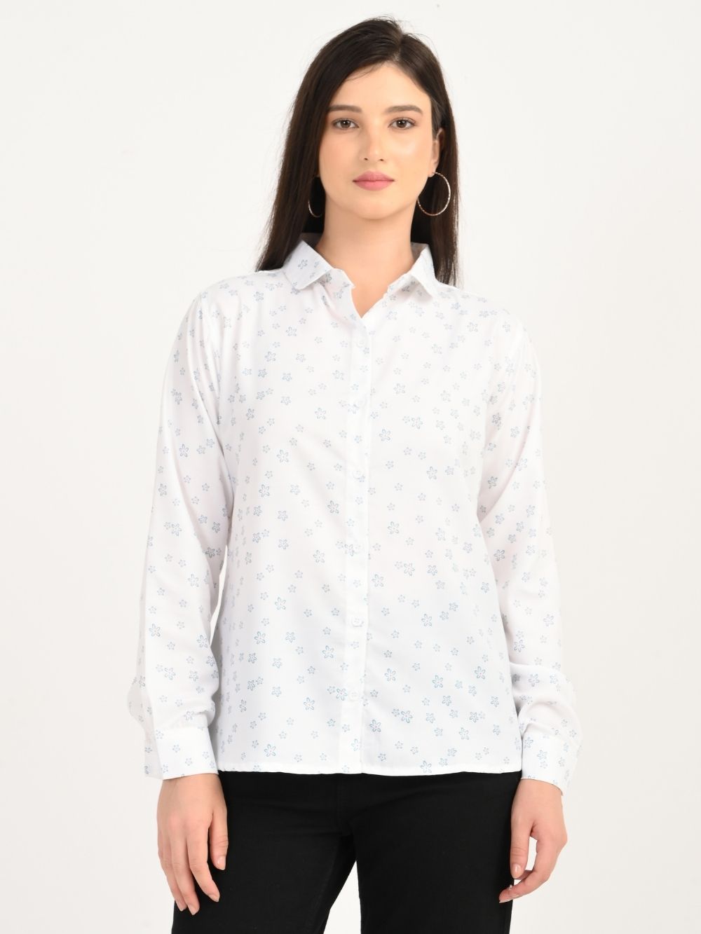 Model in Petal Charm white floral print shirt, standing pose