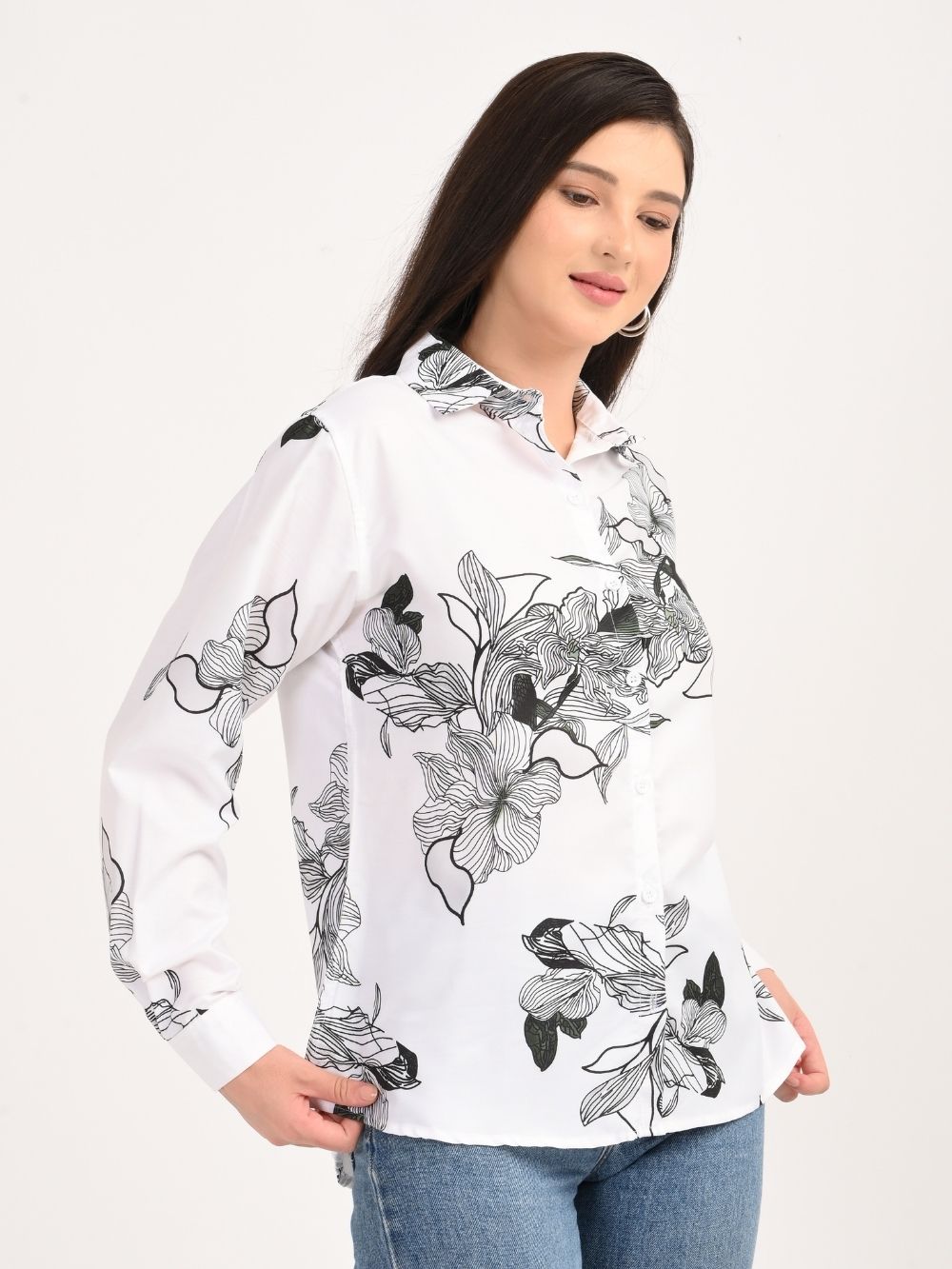 Side view of woman in monochrome floral shirt