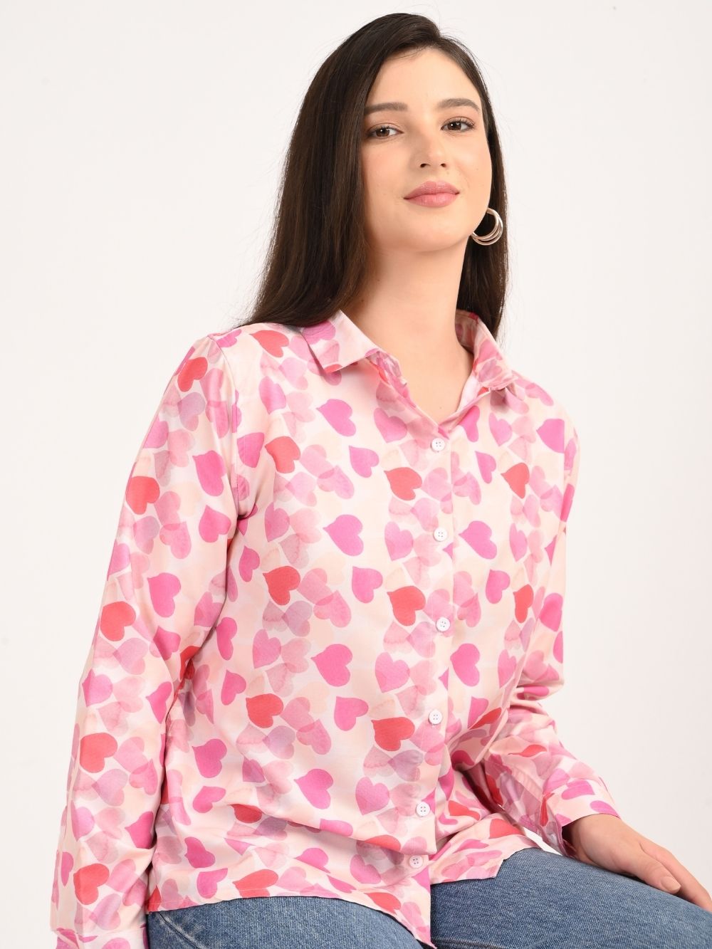 Sitting pose in pink heart print casual shirt