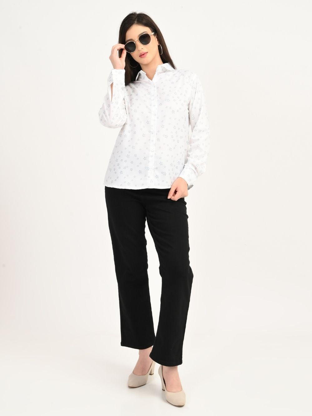 Woman styling Petal Charm floral shirt with black trousers