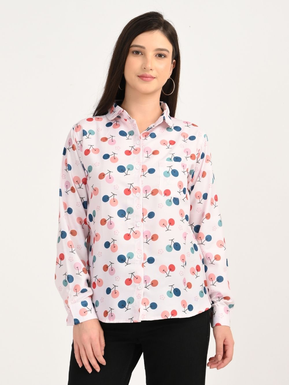 Woman wearing Cherry Bloom white shirt with multicolor cherry print, front view