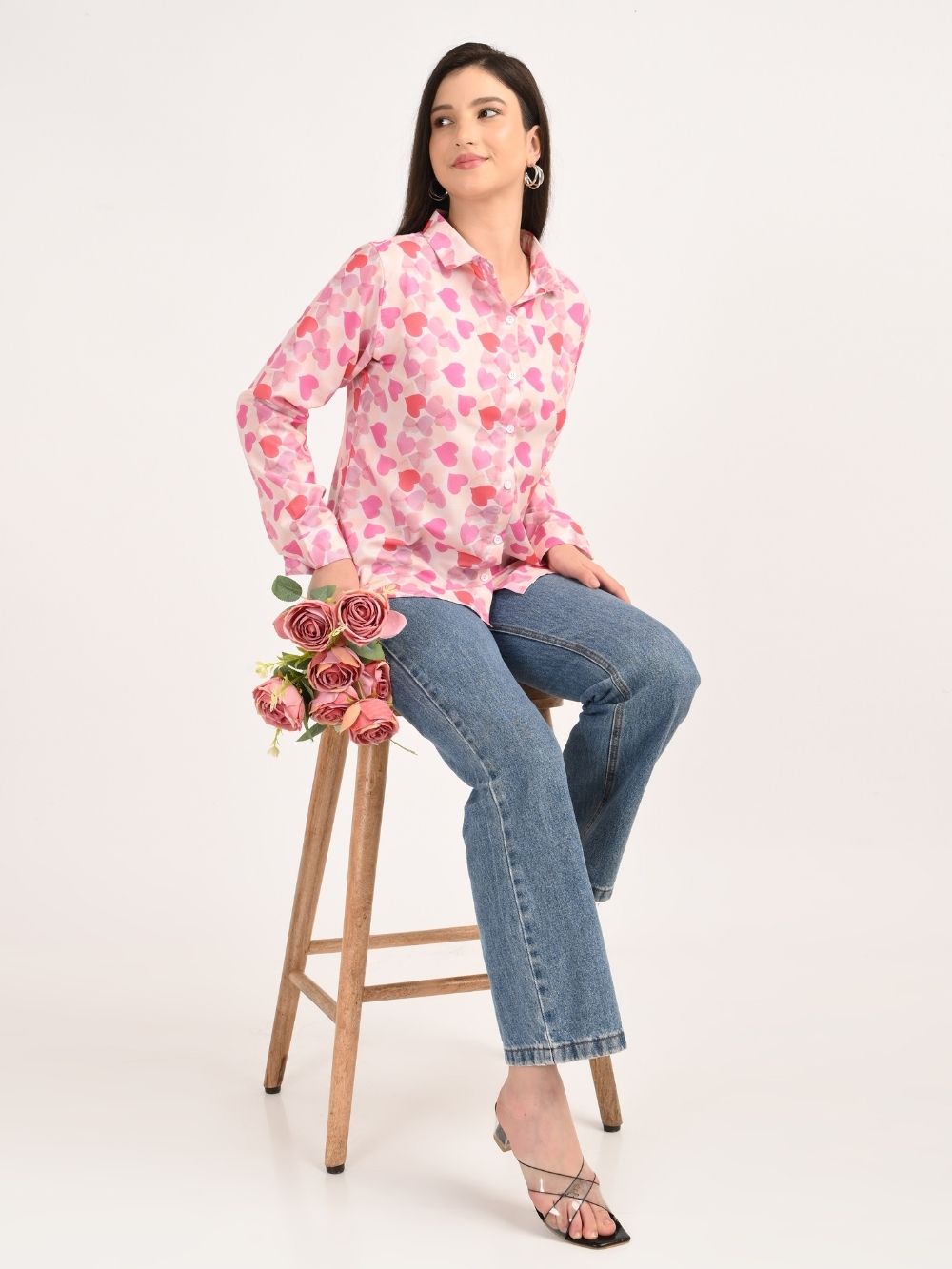 Woman wearing pink heart print rayon shirt front view